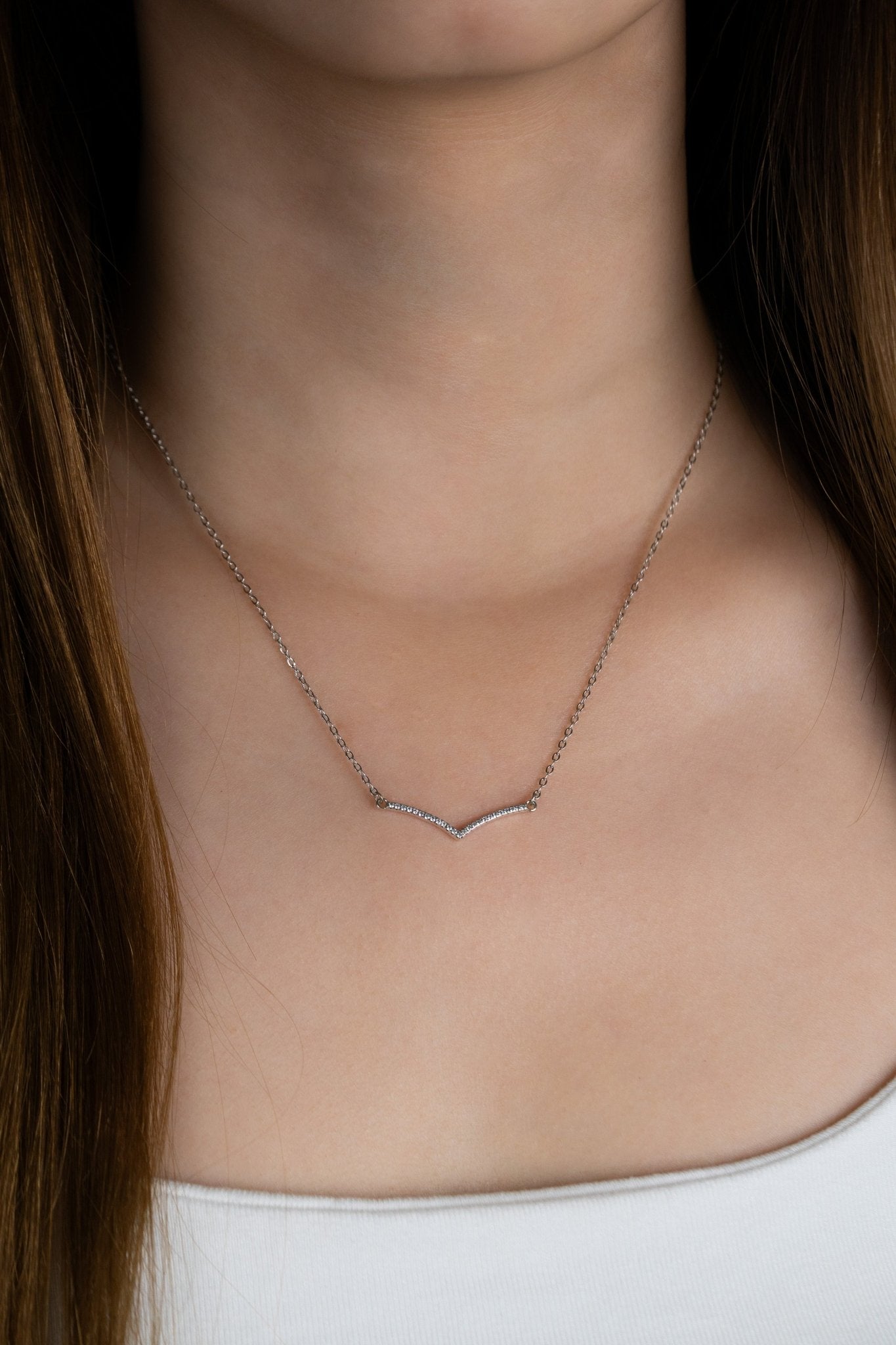 Model wearing VALENCIA Diamond Bar Necklace at the collarbone
