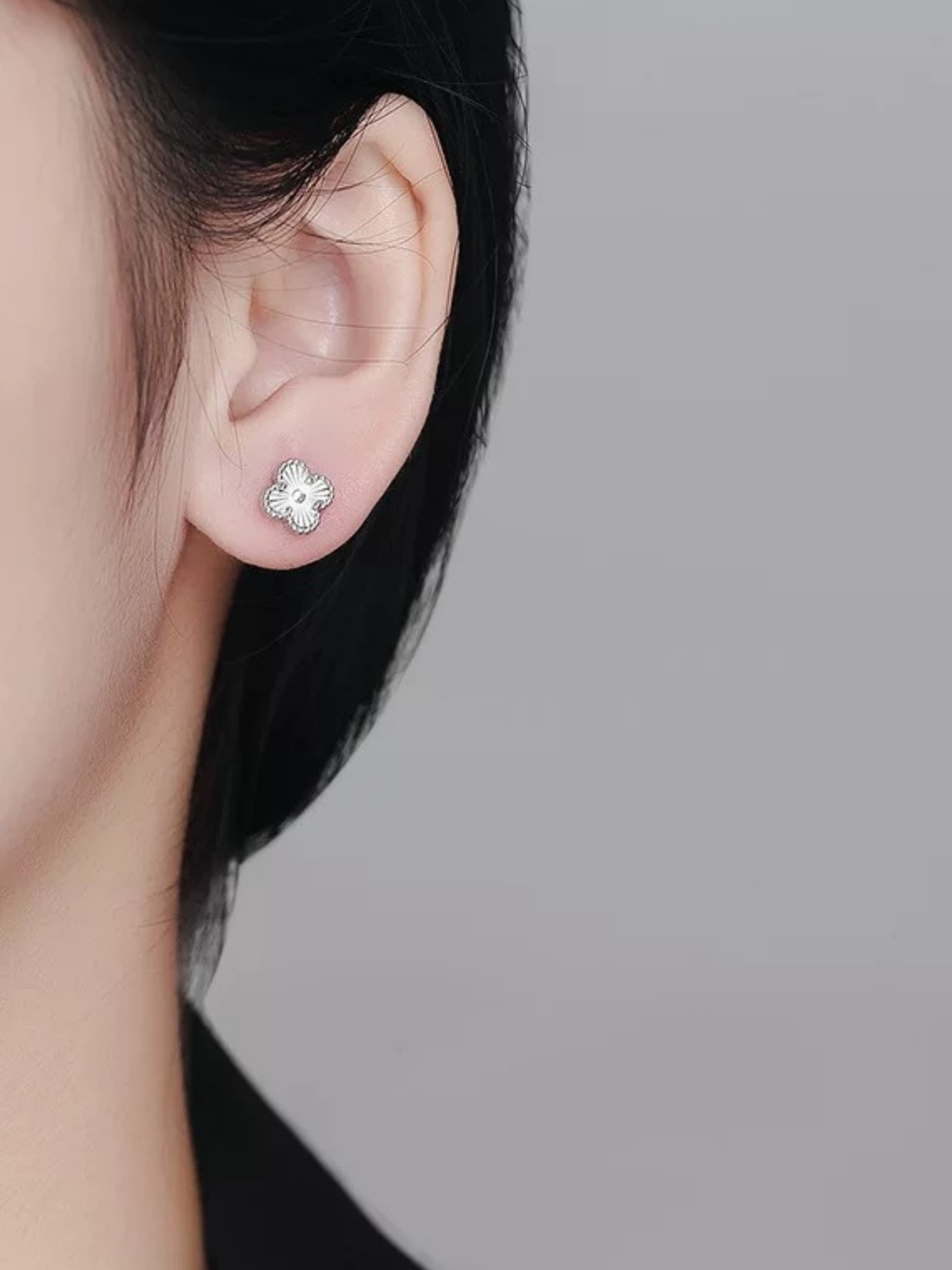 Viola Clover Barbell Earrings worn on model's ear