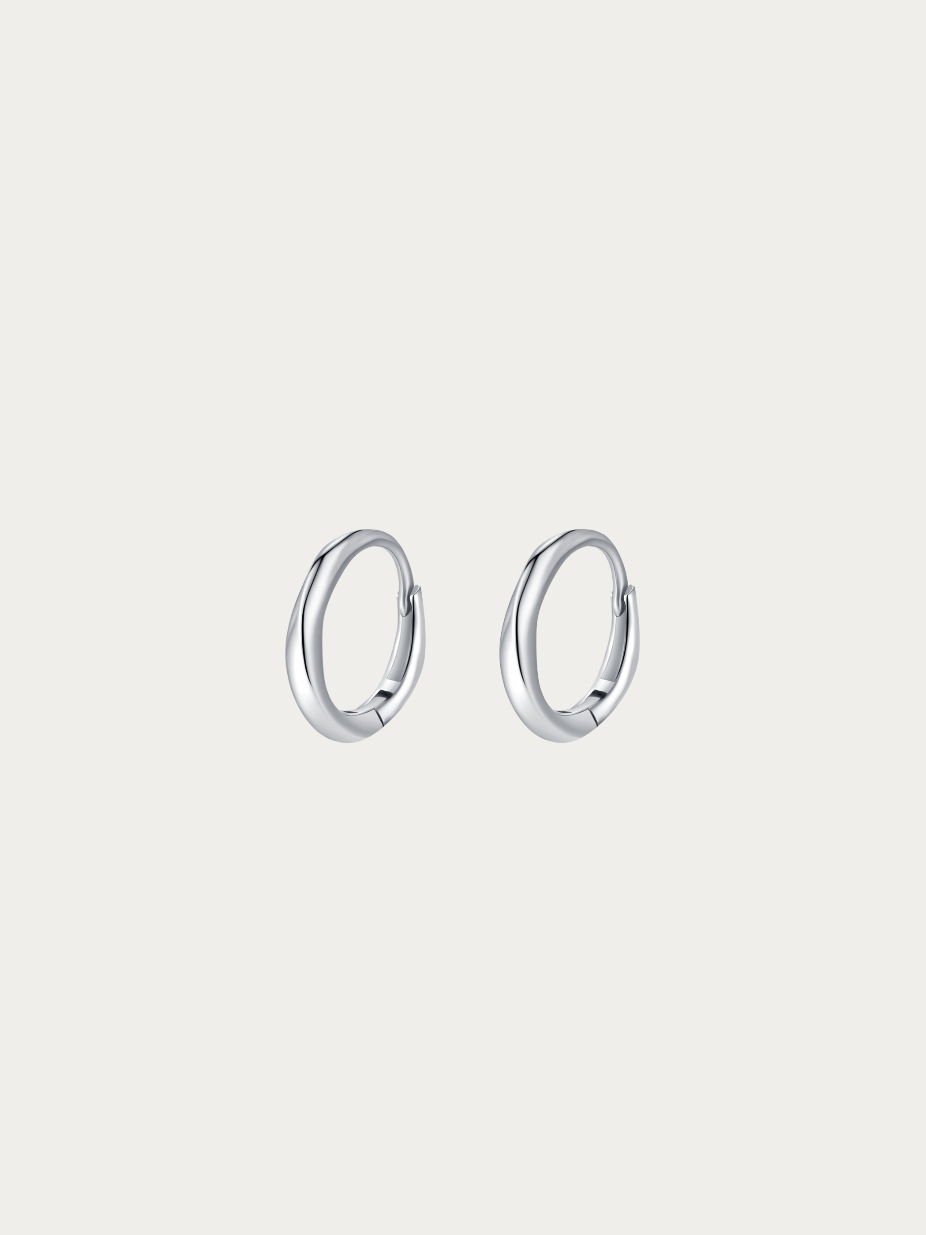 Waroq Wavy Minimalist Hoop Earrings pair in 925 sterling silver, studio hero shot