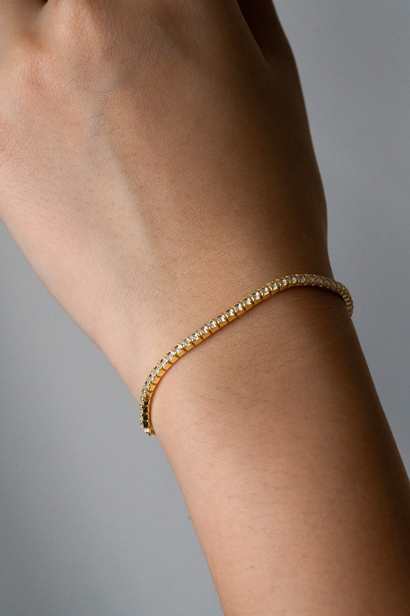 Macro detail of 4A-grade cubic zirconia stones on ZENITH Tennis Chain Adjustable Bracele