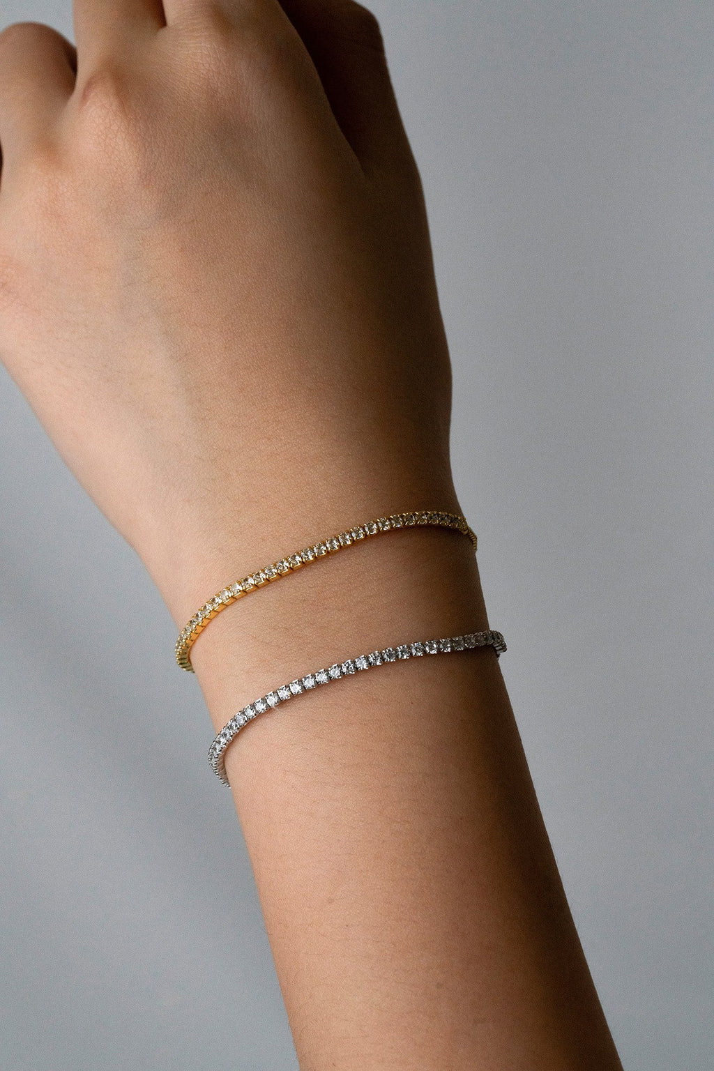 ZENITH Tennis Chain Adjustable Bracelet worn on wrist, gold and silver colour