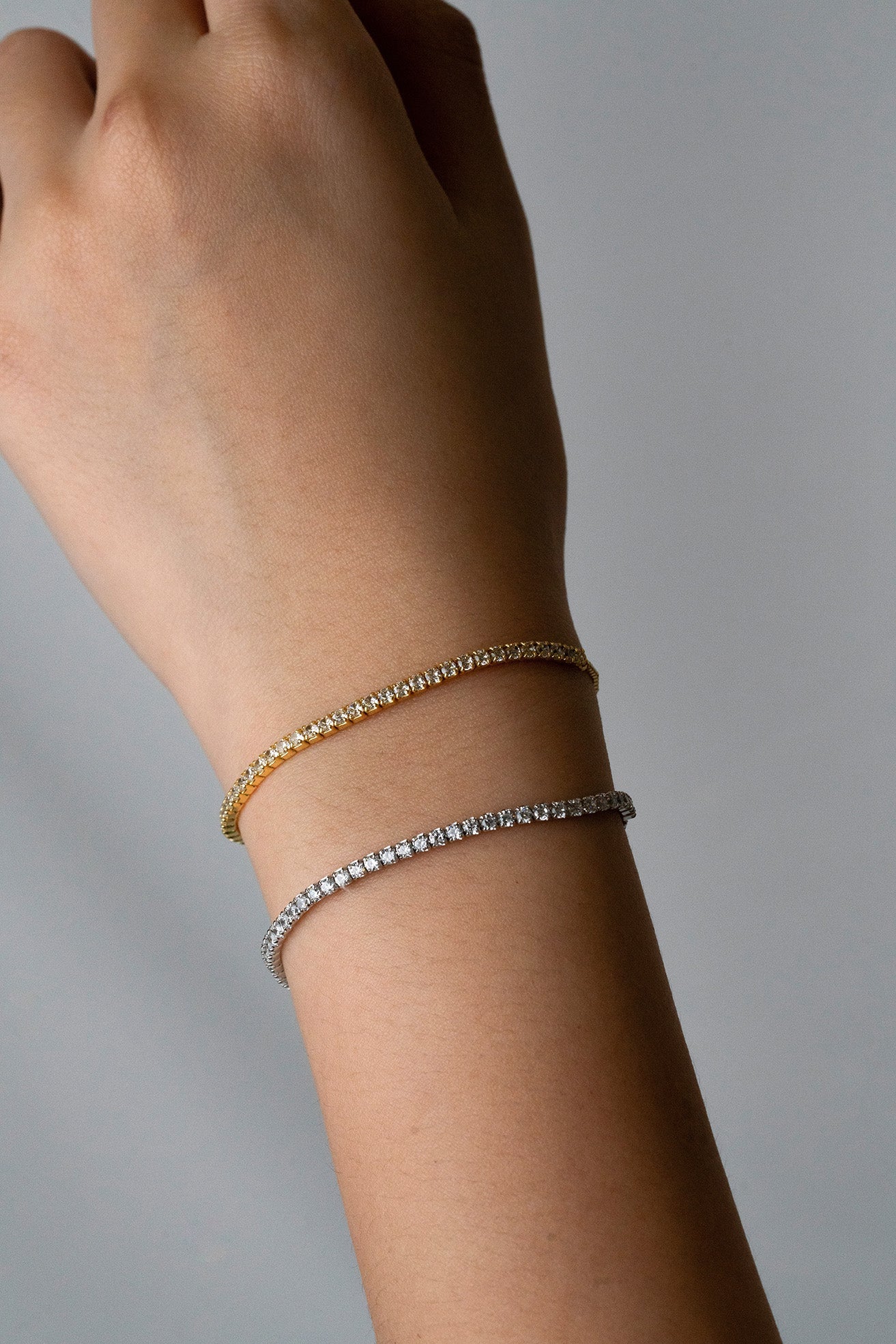 ZENITH Tennis Chain Adjustable Bracelet worn on wrist, gold and silver colour