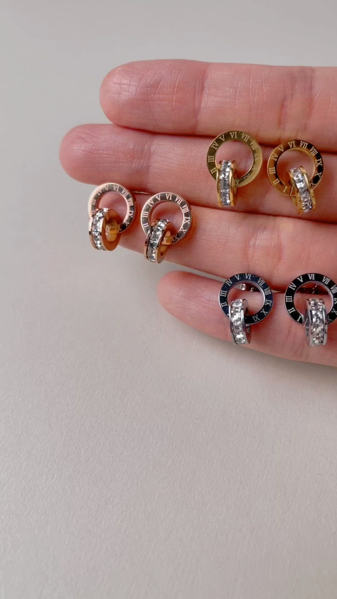 Close-up of engraved Roman details on earring