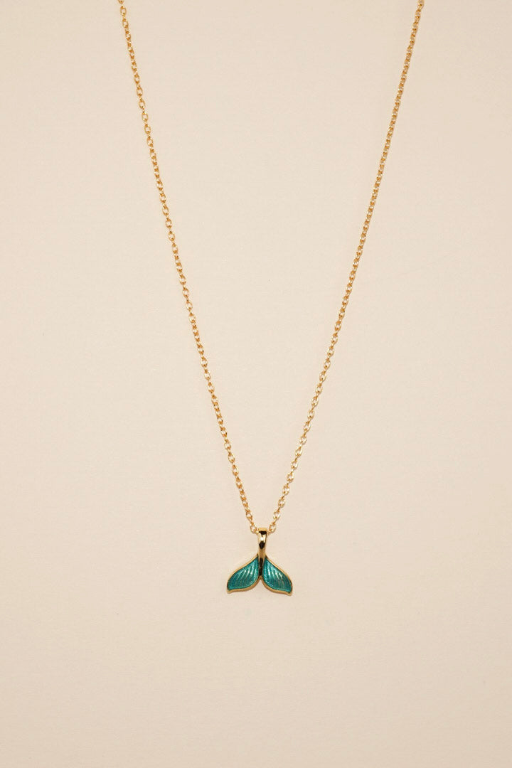 Gold blue whale tail necklace