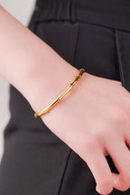Model wearing Classic Bamboo Bangle on wrist