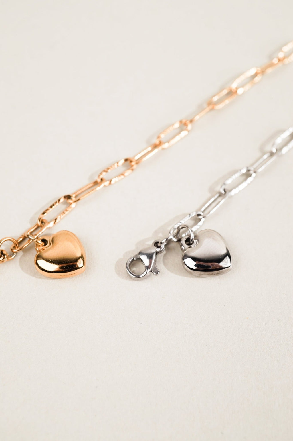 MNML Heart Chain Engravable Bracelet in silver and gold  flat lay — two colour variants