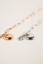 MNML Heart Chain Engravable Bracelet in silver and gold  flat lay — two colour variants