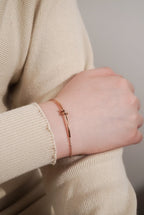 Model wearing MNML Knot Bracelet on wrist — everyday knot bracelet Malaysia