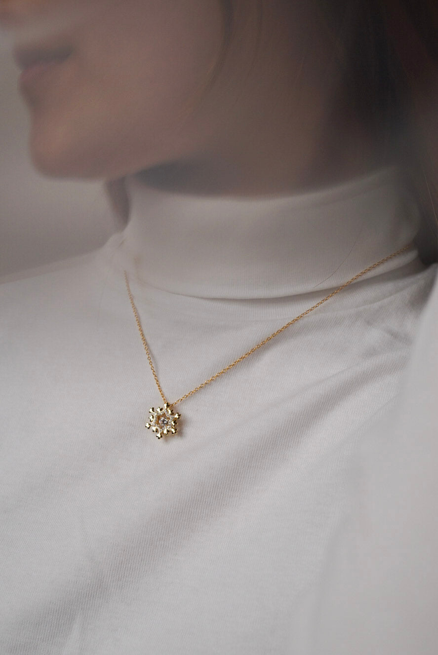 Gold Dancing Diamond Snowflake Necklace