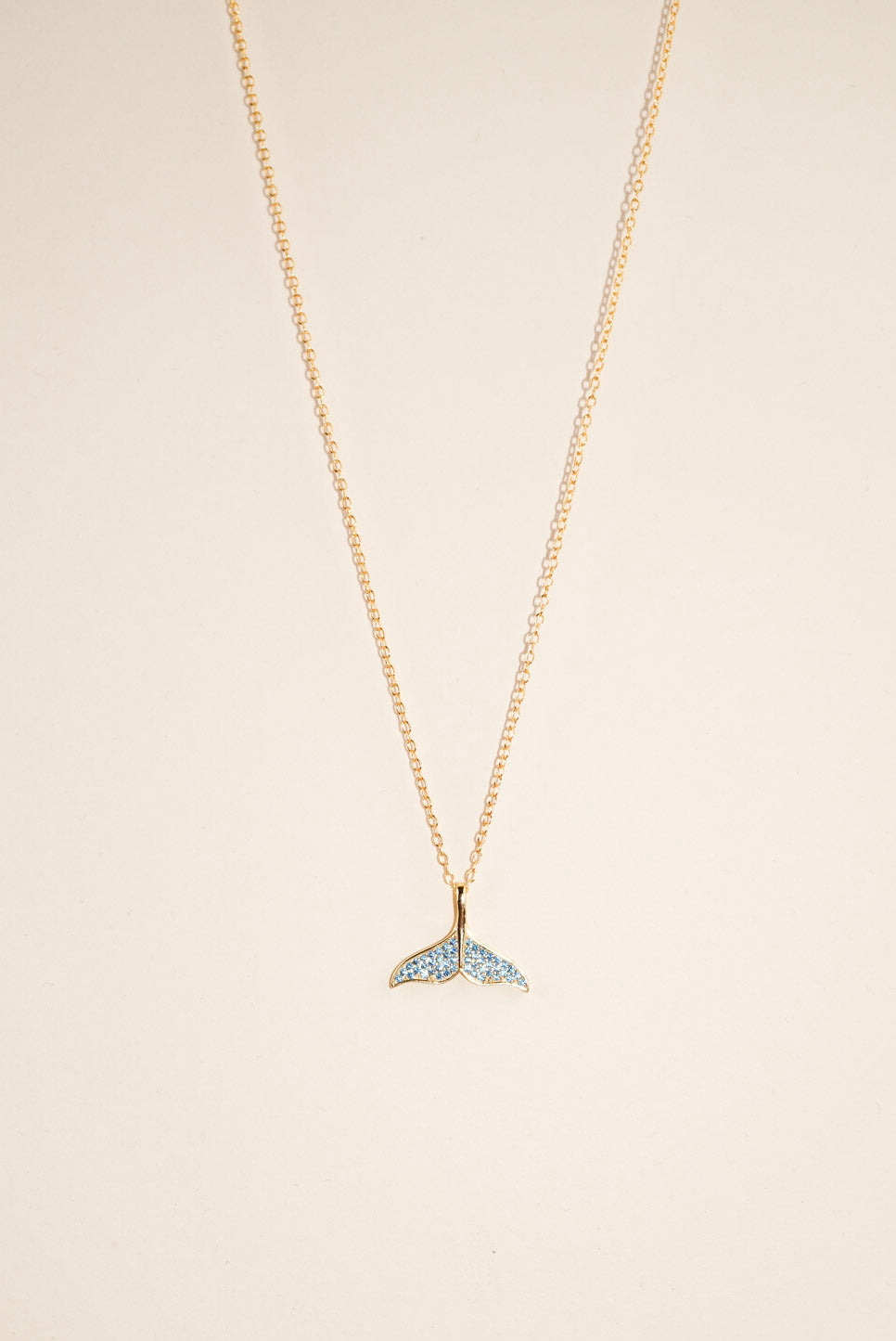 Gold Blue Stones Whale Tail Necklace